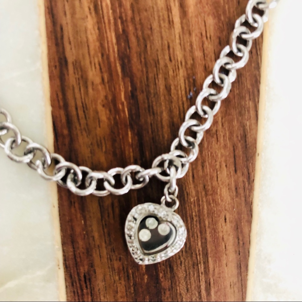 Silver toned heart necklace with crystal beads on the interior of glass chain - Picture 2 of 11